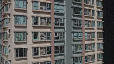 Immeubles roses et bleus à Kowloon
