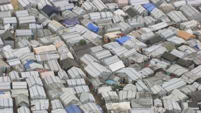 Camps de réfugiés, maisons de toile