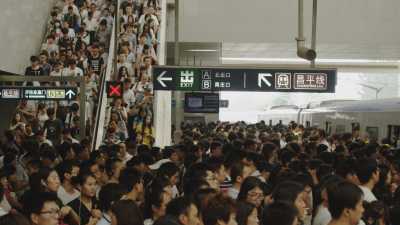 Foule dans le métro de Pékin