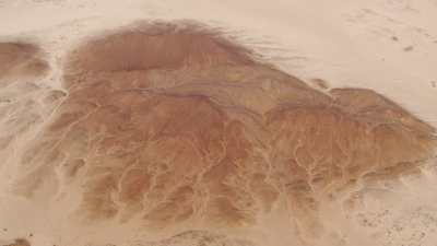 Formations rocheuses dans le sable, lever de soleil