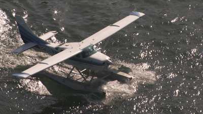 Hydravion et helicoptere sur le lac pres de COME